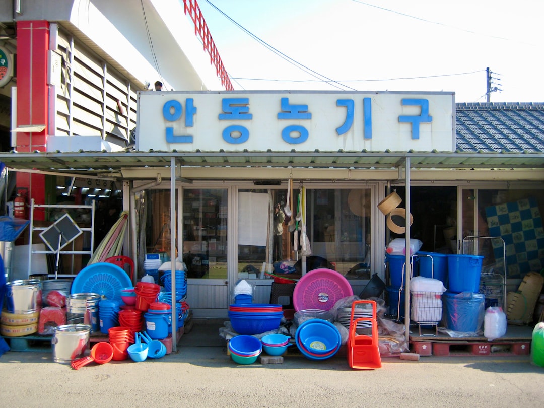 storefront-with-colorful-buckets-and-basins-displayed-goods-displayed-goods-cxclohk5shi